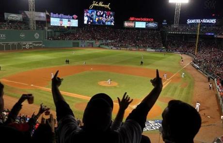 RED SOX SLIDER24 24redsoxSlider34 Boston, MA - 10/24/2018 - Fans celebrate during Game 2 of the World Series. The Boston Red Sox host the Los Angeles Dodgers in Game 2 of the World Series at Fenway Park. (Stan Grossfeld/Globe staff)
