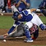 Los Angeles, CA - 10/27/2018 - (13th inning) Boston Red Sox third baseman Eduardo Nunez (36) is upended by Los Angeles Dodgers catcher Yasmani Grandal (9) in the thirteenth inning. The Los Angeles Dodgers host the Boston Red Sox in Game 3 of the World Series at Dodger Stadium. - (Barry Chin/Globe Staff), Section: Sports, Reporter: Peter Abraham, Topic: 27Dodgers-Red Sox, LOID: 8.4.3624881052.