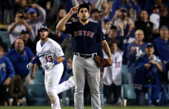 RED SOX SLIDER26 Los Angeles, CA - 10/27/2018 - Red Sox Nathan Eovaldi watches the flight of Dodgers Max Muncy (background) walk off home run in the 18th inning. Los Angeles Dodgers hosted the Boston Red Sox in Game 3 of the World Series at Dodger Stadium. (Stan Grossfeld/Globe Staff)