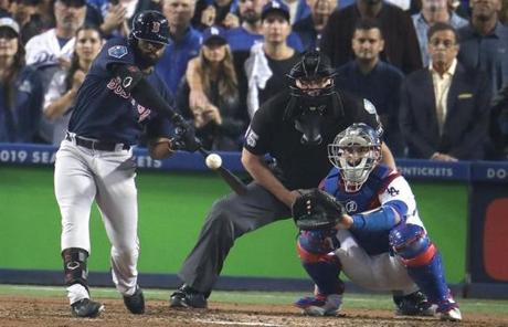 RED SOX SLIDER26 Los Angeles, CA - 10/26/2018 - Red Sox Jackie Bradley Jr. hits a solo home run in the eighth inning. Los Angeles Dodgers hosted the Boston Red Sox in Game 3 of the World Series at Dodger Stadium. (Stan Grossfeld/Globe Staff)
