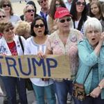 Women waited to attend a rally in Pennsylvania for candidate Donald Trump in 2016.