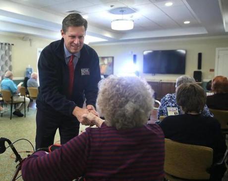 Canton, MA - 10/24/18 - Before speaking, U.S. Senate candidate Geoff Diehl (cq) greets residents at BrightView Senior Living (cq), in Canton. Photo by Pat Greenhouse/Globe Staff Topic: 15DiehlRecordMetro Reporter: Victoria McGrane
