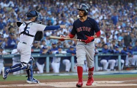 RED SOX SLIDER27 Los Angeles, CA - 10/27/2018 - Mookie Betts strikes out in the first inning of Game 4 of the World Series. The Los Angeles Dodgers host the Boston Red Sox in Game 4 of the World Series at Dodger Stadium. (Jim Davis/Globe staff)
