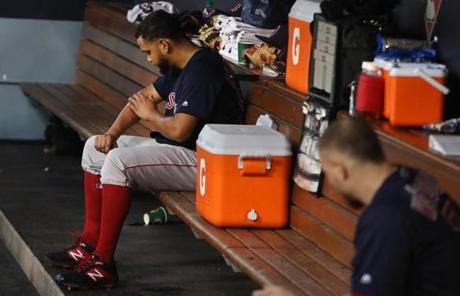 RED SOX SLIDER27 Los Angeles, CA - 10/27/2018 - Red Sox starting pitcher Eduardo Rodriguez checks himself out in the dugout after being hit by pitch in the third inning of Game 4 of the World Series. The Los Angeles Dodgers host the Boston Red Sox in Game 4 of the World Series at Dodger Stadium. (Jim Davis/Globe staff)

