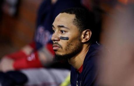 RED SOX SLIDER27 Los Angeles, CA - 10/27/2018 - Red Sox outfielder Mookie Betts in the dugout during the fourth inning of Game 4 of the World Series. The Los Angeles Dodgers host the Boston Red Sox in Game 4 of the World Series at Dodger Stadium. (Jim Davis/Globe staff)
