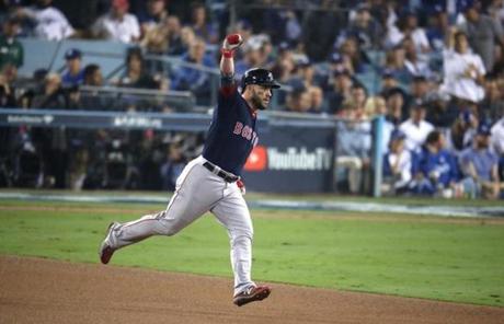 RED SOX SLIDER27 Los Angeles, CA - 10/27/2018 - Red Sox Steve Pearce reacts his solo home run while rounding second base in the seventh inning. Los Angeles Dodgers hosted the Boston Red Sox in Game 3 of the World Series at Dodger Stadium. (Stan Grossfeld/Globe Staff)
