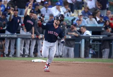 Los Angeles, CA - 10/28/2018 - Red Sox Steve Pearce rounds the bases after hitting a two home run home run in the first inning. the Los Angeles Dodgers hosted the Boston Red Sox in Game 5 of the World Series at Dodger Stadium. (Stan Grossfeld/Globe Staff)
