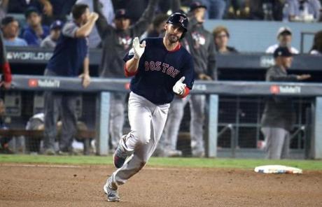RED SOX SLIDER28 Los Angeles, CA - 10/28/2018 - Red Sox J.D. Martinez rounds the bases after hitting a solo home run in the seventh inning. Los Angeles Dodgers hosted the Boston Red Sox in Game 5 of the World Series at Dodger Stadium. (Stan Grossfeld/Globe Staff)
