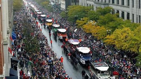 Duck Boats carried Red Sox team members moved along Boylston Street in 2004. 
