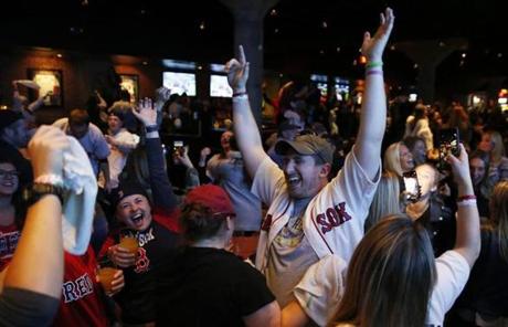 RED SOX SLDIER28 Boston, MA--10/28/2018-- Red Sox fans celebrate inside Tony C's Sports Bar after the Red Sox beat the Dodgers to win the 2018 World Series. (Jessica Rinaldi/Globe Staff) Topic: 29soxfans Reporter: 
