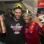J.D. Martinez and Mookie Betts toast the moment. 