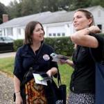 On the campaign trail: Dr. Katie McBrine (right), of Hingham, with campaign manager Melissa Smith. 