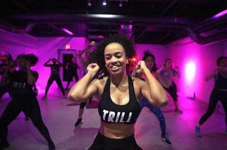 Head instructor Melisa Valdez (center) led a one-hour Cardio Dance class at Trillfit in Mission Hill, which holds its grand opening this weekend. 
