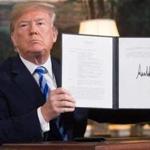 President Donald Trump signed a document reinstating sanctions against Iran in May. 