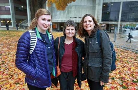 Mary Humble (center), her daughter Deirdre Hutchison (right), and her granddaughter Georgina Hutchison (left) all study at UMass Lowell.
