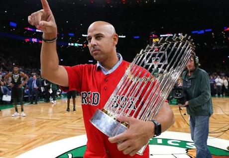 Manager Alex Cora brought the World Series trophy to a Celtics game.
