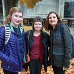 Mary Humble (center), her daughter Deirdre Hutchison (right), and her granddaughter Georgina Hutchison (left) all study at UMass Lowell.