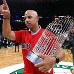 Manager Alex Cora brought the World Series trophy to a Celtics game.