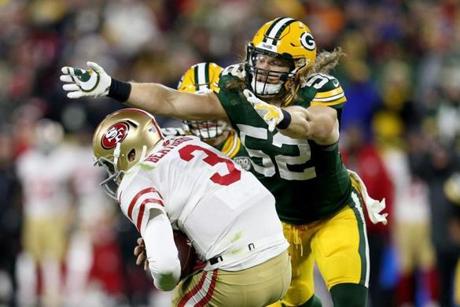 GREEN BAY, WI - OCTOBER 15: Clay Matthews #52 of the Green Bay Packers sacks C.J. Beathard #3 of the San Francisco 49ers in the fourth quarter at Lambeau Field on October 15, 2018 in Green Bay, Wisconsin. (Photo by Dylan Buell/Getty Images)
