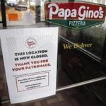 A sign posted Monday on the door of a Papa Gino's Pizzeria location in Marlborough states that it is now closed. 