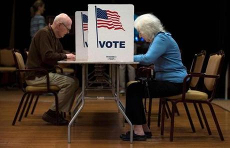 MIDTERMS SLIDER People vote at the Greenspring Retirement center during the mid-term election day in Fairfax, Virginia on November 6, 2018. (Photo by ANDREW CABALLERO-REYNOLDS / AFP)ANDREW CABALLERO-REYNOLDS/AFP/Getty Images
