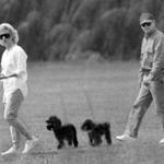 Dorchester-1988-Whitey Bulger and Catherine Greig walk together with her two poodles. BlackMassCast