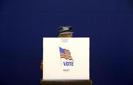 MIDTERMS SLIDER A voter fills out a ballot at a polling place at Lake Shore Elementary School, Tuesday, Nov. 6, 2018, in Pasadena, Md. (AP Photo/Patrick Semansky)
