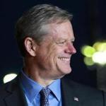 Governor Charlie Baker during a light moment Wednesday evening after Mayor Daniel Rivera of Lawrence (not pictured) made a joke at his own expense as they spoke to reporters outside the headquarters of Columbia Gas in Lawrence.