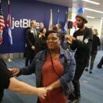 Tanisha Cooper (right) got to do a little salsa dancing before boarding JetBlue?s inaugural flight from Boston Logan International Airport to Havana, Cuba, on Saturday.