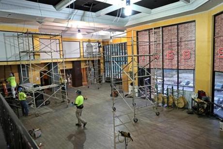Workers readied the sports betting area last week at Twin River Casino in Lincoln, R.I.
