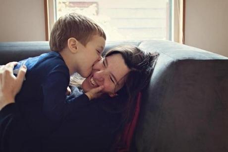 Dr. Pager with her son, Atticus, in their Cambridge home in 2016. 
