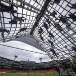 As a part of the Spartan Race over the weekend, participants scaled a ropes obstacle in the outfield of Fenway Park. 