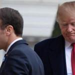 (FILES) In this file photo taken on November 10, 2018 US President Donald Trump (R) is welcomed by French president Emmanuel Macron prior to their meeting at the Elysee Palace in Paris, on November 10, 2018, on the sidelines of commemorations marking the 100th anniversary of the 11 November 1918 armistice, ending World War I. - US President Donald Trump mocked Emmanuel Macron November 13, 2018 for his 