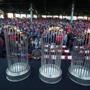 BOSTON, MA - 10/31/2018 - World Championship trophies sit on the Red Sox dugout before the ceremony inside Fenway Park before the Duck Boat parade. (Stan Grossfeld/Globe staff)