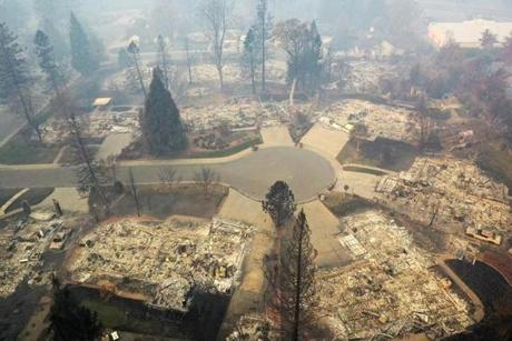 PARADISE, CA - NOVEMBER 15: An aerial view of a neighborhood destroyed by the Camp Fire on November 15, 2018 in Paradise, California. Fueled by high winds and low humidity the Camp Fire ripped through the town of Paradise charring over 140,000 acres, killing at least 56 people and destroying over 8,500 homes and businesses. The fire is currently at 40 percent containment. (Photo by Justin Sullivan/Getty Images)
