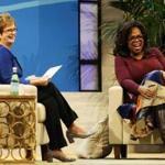 Oprah Winfrey (left) and UMass Lowell Chancellor Jacquie Moloney chatted Thursday at the Tsongas Center in Lowell.