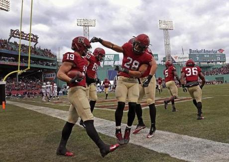 At Fenway Park, Harvard celebrated winning the 135th playing of The Game.
