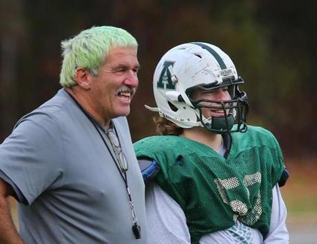 Abington coach Jim Kelliher will be on the sideline for his 52d Thanksgiving game. Here with Sam Malafonte prior to the 2014 game, he began dying his hair green in 2007. 
