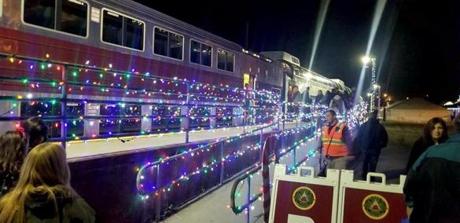 In Wareham, the Christmas train prepped for a special ride with hundreds of first responders and their families on Saturday night. The locomotive hit and killed a man and a woman on the tracks. 

