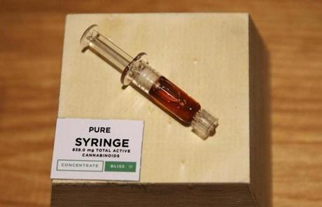 Leicester, MA, 11/20/2018 -- A Pure Syringe on display at the opening of Cultivate, one of the state's first two pot shops. This the first day the store can sell recreational marijuana to adults 21 and older. (Jessica Rinaldi/Globe Staff) Topic: 21potopen Reporter: 

