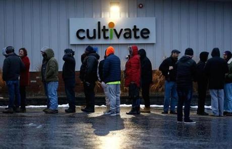 Potential customers lined up outside of Cultivate in Leicester Tuesday morning. 
