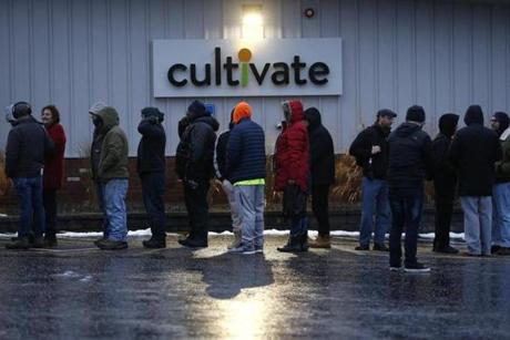 People waited in line for the opening of Cultivate. 

