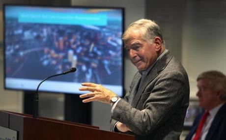 Former Mass. governor Michael Dukakis appeared before the MBTA board to express his support for a North-South rail link in Boston. Seated in the backround is former Mass. governor William Weld, who spoke after Dukakis. 
