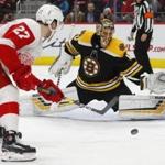 Boston Bruins goaltender Tuukka Rask (40) stops a Detroit Red Wings center Michael Rasmussen (27) shot in the second period of an NHL hockey game Wednesday, Nov. 21, 2018, in Detroit. (AP Photo/Paul Sancya)