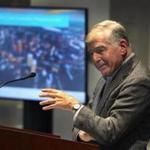 Former Mass. governor Michael Dukakis appeared before the MBTA board to express his support for a North-South rail link in Boston. Seated in the backround is former Mass. governor William Weld, who spoke after Dukakis. 