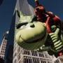 Dr. Seuss' Grinch balloon heads down Sixth Avenue during the 91st Annual Macy?s Thanksgiving Day Parade, in New York, Nov. 23, 2017. (Vincent Tullo/The New York Times) 