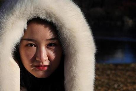 Meisha Duan of Los Angeles was dressed for the cold while visiting Boston on Thursday.
