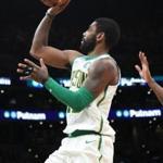 Boston MA 11/21/18 Boston Celtics Kyrie Irving pulls up for a floater beating New York Knicks Emmanuel Mudiay during first quarter action at TD Garden. (photo by Matthew J. Lee/Globe staff) topic: reporter: 