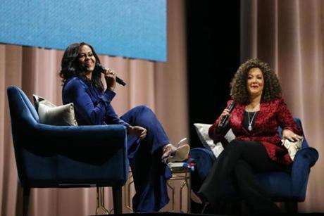 Former first lady Michelle Obama and moderator Michele Norris addressed the crowd at TD Garden Saturday night.
