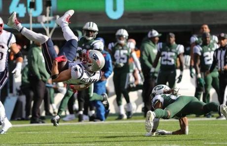 Patriots wide receiver Julian Edelman was upended by Jets cornerback Darryl Roberts in the first quarter.

